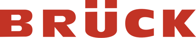 Rotes Wort BRÜCK in Großbuchstaben auf weißem Hintergrund.